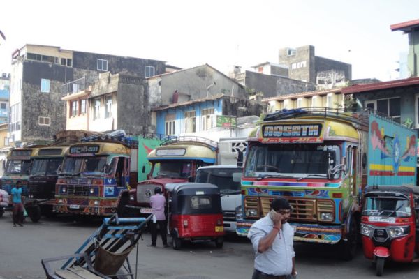 Lorries parked near the main trading bazaar of the Colombo fort waiting to be loaded a Colombo city attraction
