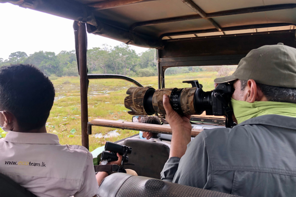 A photographer in action during a Wilpattu Safari