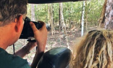 A Wilpattu safari guest is taking a picture