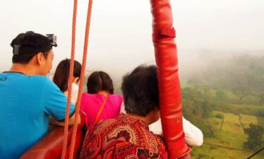 Experiencing the hot air ballooning tour with their family in Sri Lanka